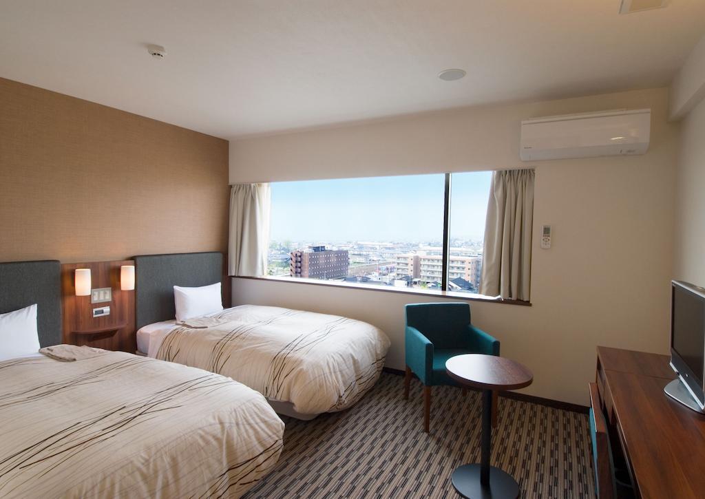 Uozu Manten Hotel Ekimae Номер фото