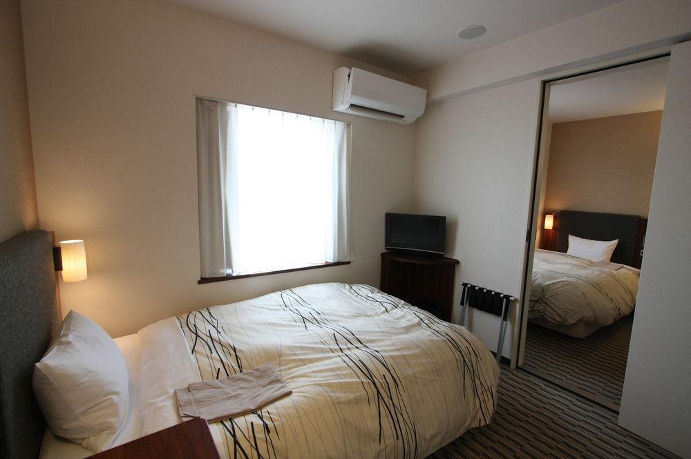 Uozu Manten Hotel Ekimae Экстерьер фото
